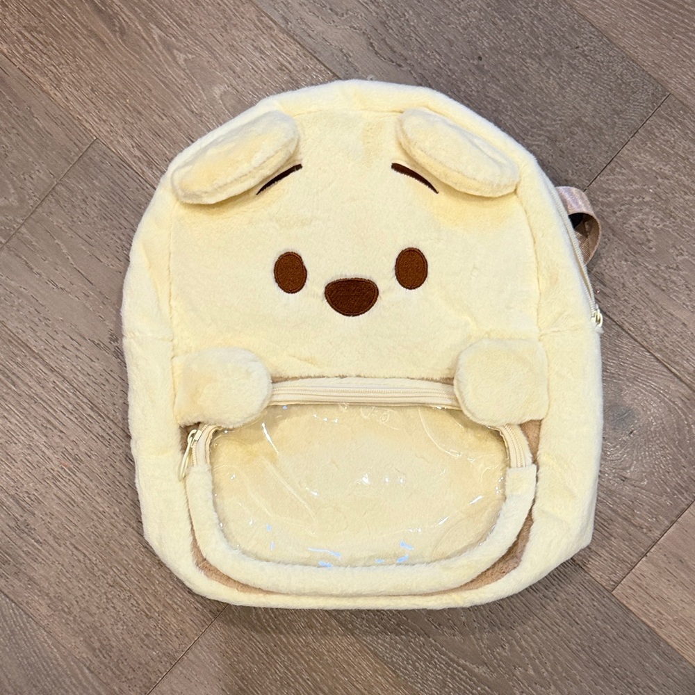 Disney Miniso Winnie the Pooh fuzzy backpack. Like New.